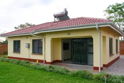 Image de Cosy home near airport comfy beds family friendly entire house