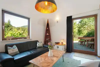 Image de Appartement de vacances 'Reuterwanne' avec vue sur les montagnes, grand jardin et terrasse privée