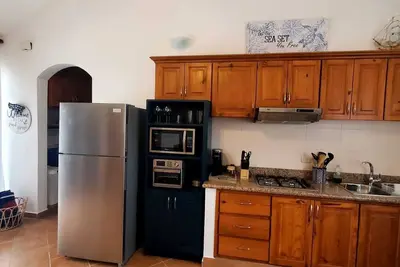 Image de Family-sized condo 5 minutes from the Beach