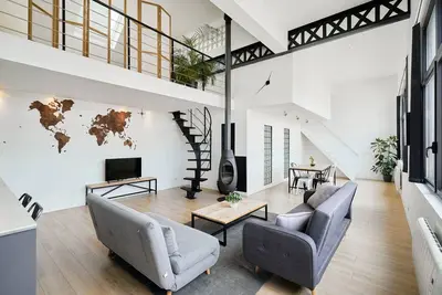 Image de Superbe loft en duplex 3 chambres + parking.