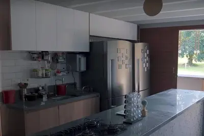 Image de Sitio com 8 Suítes na Linha Verde com rio e Piscina, a 15 Minutos da Praia