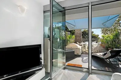 Image de Appartement 'Casa Simona' avec vue sur la mer, piscine partagée et terrasse privée