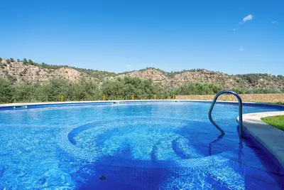 Image de Maison de vacances \"Mas De Lorena\" avec vue sur les montagnes, piscine partagée et Wi-Fi