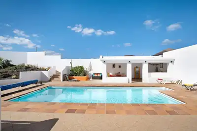 Image de Maison de vacances \"Casa Sol y Mar Tías\" avec vue sur la mer, piscine partagée et Wi-Fi