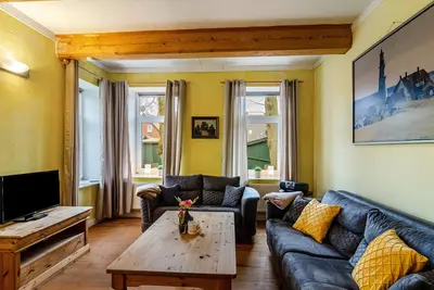 Image de Appartement 'Gulfhof Oldersum Erdgeschoss' avec terrasse partagée, jardin partagé et Wi-Fi