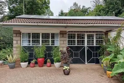 Image de Cozy, Tiny house in Karen with gorgeous garden.