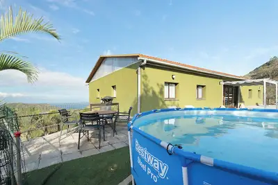 Image de Appartement de vacances 'Casa Lomo El Aire Sterlizia' avec vue sur la mer, piscine partagée et Wi-Fi