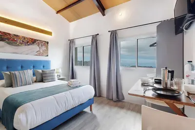Image de Appartement de vacances 'Casa Lomo El Aire Brezo' avec vue sur la mer, piscine partagée et Wi-Fi