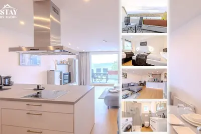 Image de Premium Zuhause - Seeblick Balkon Seepromenade