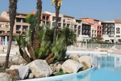 Image de Appartement climatisé bord de plage et piscine