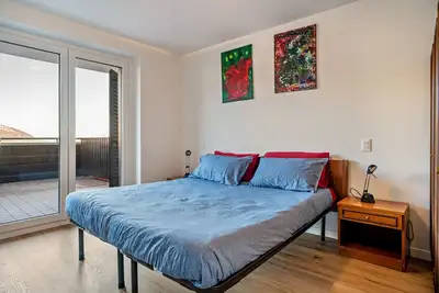 Image de Appartement 'Appartamento Polsa 4' avec vue sur les montagnes, terrasse privée et jardin partagé