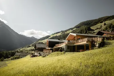 Image de Appartement de vacances 'Chalet-Suite Wasser' avec vue sur la montagne, terrasse privée et Wi-Fi