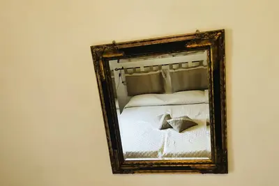 Image de Camera accogliente con tv 32 pollici aria condizionata bagno privato
