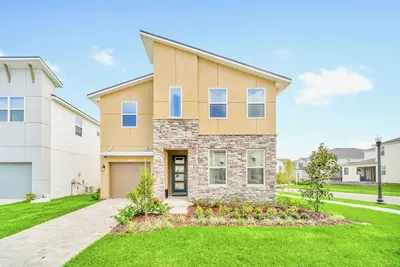 Image de 8br/6. 5ba Pool/Game/Free Water Park Villa@ Solara 8 Miles to Disney