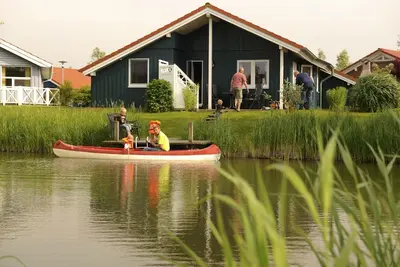 Image de Gemütlich und Kinderfreundlich Eingerichtetes Ferienhaus Direkt am Wasser