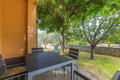 Image de Holiday apartment Lyna on the ground floor with garden in a quiet location 300m from the beach with crystal clear sea