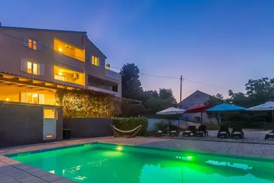 Image de Apartment Naya with large heated pool 50m2