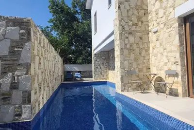 Image de Olive Garden's Paradise Villa with private swim up pool and picturesque village.