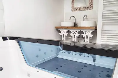 Image de l'Alchimiste - Appartement moderne avec jacuzzi