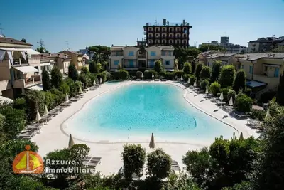 Image de Appartement 'Residence Borgo Dei Fiori A06' avec piscine partagée et terrasse privée