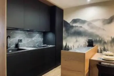 Image de Dolomiti Haus 300 ft from Pampeago ski lifts.