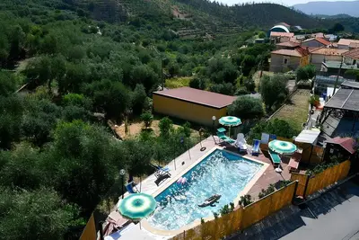 Image de Studio 'Gli Angeli Nonna Erminia E Vittorio' avec piscine partagée, Wi-Fi et climatisation