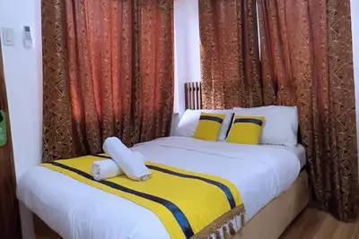 Image de Welcome to our budget-friendly hostel, where you can enjoy an affordable stay.
