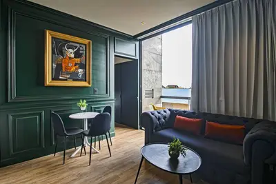 Luxe apartment with courtyard, rooftop pool, & balcony - in a great location