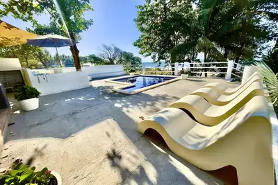 Image de Beautiful beach house on private beach and perfect beach break