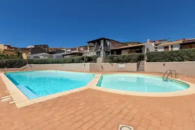 Image de Maison de vacances \"Nuages\" avec piscine partagée et terrasse privée