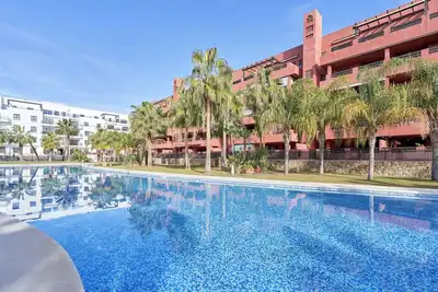 Image de Appartement \"Playa Granada Golf\" avec vue sur la montagne, piscine partagée et Wi-Fi