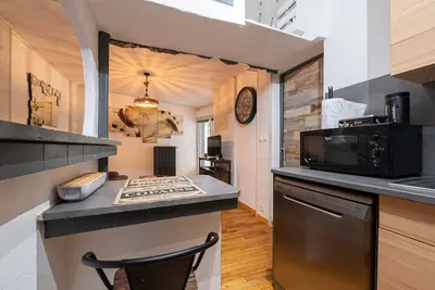 Image de \"Domaine Moulin Blanc - Gîte Hermine\" avec terrasse privée et Wi-Fi