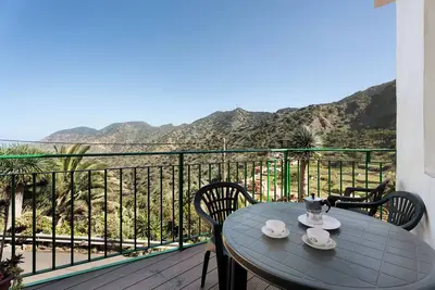 Image de Maison de vacances 'Casa De Berta' avec vue sur les montagnes, terrasse privée et Wi-Fi