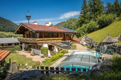 Image de Alpines Juwel: Entspannung und Tradition im Ferienhaus Gipfelstürmer mit Pool