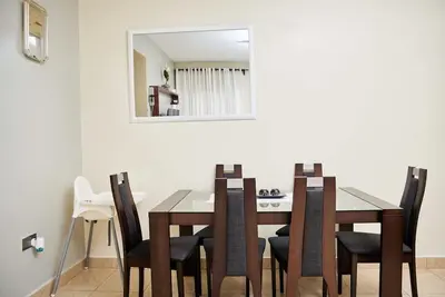 A Tranquil 2 bedroom apartment with Wi-Fi & gym.