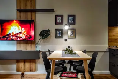 Image de 200 meters from the ski gondola, comfortable studio-apartment with free parking.