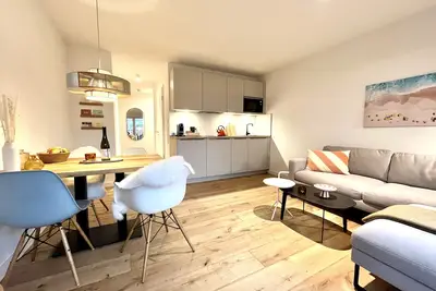 Image de Neubau-wohnung, Private Sauna & Terrasse, 63m², 150m zum Strand, 2 Sz, 2 Bäder