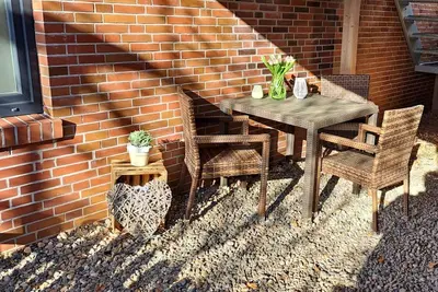 Image de Ferienwohnung Glück >Im Herzen von Dornum