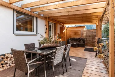 Image de Appartement 'Ferienwohnung Gartenblick' avec vue sur la montagne, piscine partagée et Wi-Fi