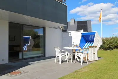Image de Helle Ferienwohnung im Herzen Wenningstedts Nahe der Pulsierenden Kurpromenade
