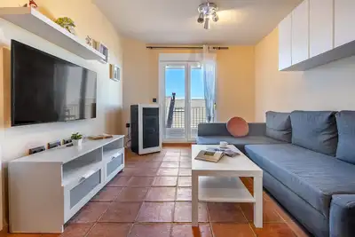 Image de Appartement 'Appartement Supérieur 31 C' avec vue montagne, terrasse privée et Wi-Fi