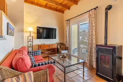 Image de Appartement de vacances \"Duplex Deluxe 23 B\" près des pistes avec terrasse privée et Wi-Fi