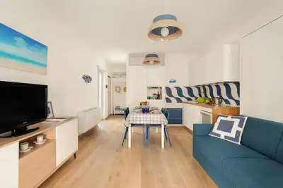 Image de La Caravella 2 :beachfront, new and charming apartment in the center.