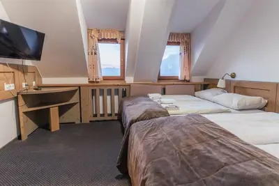 Image de Krvavec Quadruple room 4