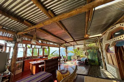 Image de Earthship 3-level apt. , portside, connected to an outdoor kitchen with a view.