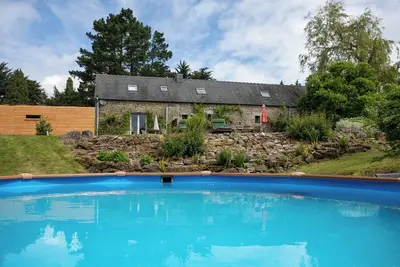 Image de Gîte Domaine de La Blanche Hermine - Ty Morgane' avec piscine partagée, jardin partagé et Wi-Fi