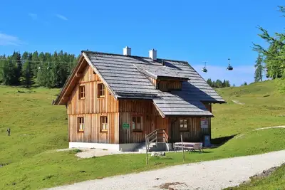 Image de Maison de vacances 'Große Winklerhütte' avec vue sur les montagnes et jardin privé