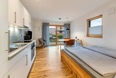 Image de Studio 'Sonnenhalde' avec vue sur le lac, terrasse privée et Wi-Fi