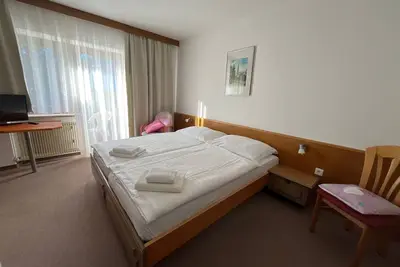 Image de Zimmer 04 / 2bett mit Balkon - Pension Alpina