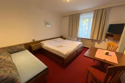 Image de Zimmer 18 / 3bett Ohne Balkon - Pension Alpina